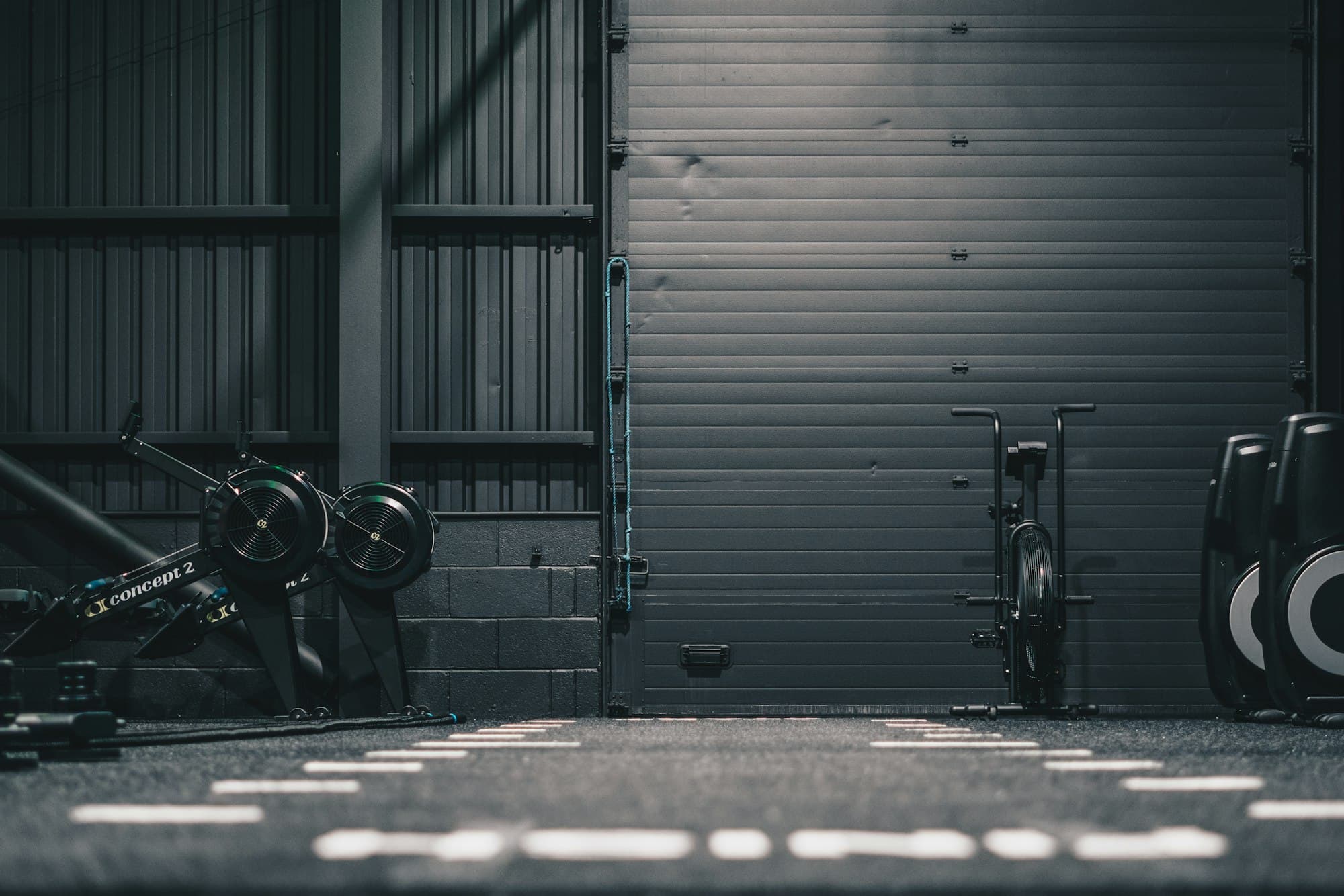 Dumbbell rack in a dark gym