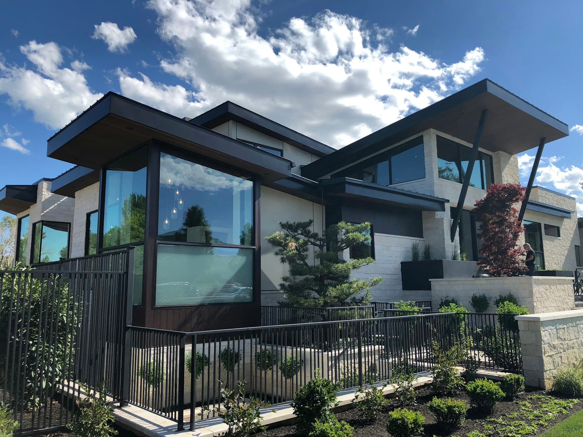 Modern wooden house under a wide blue sky