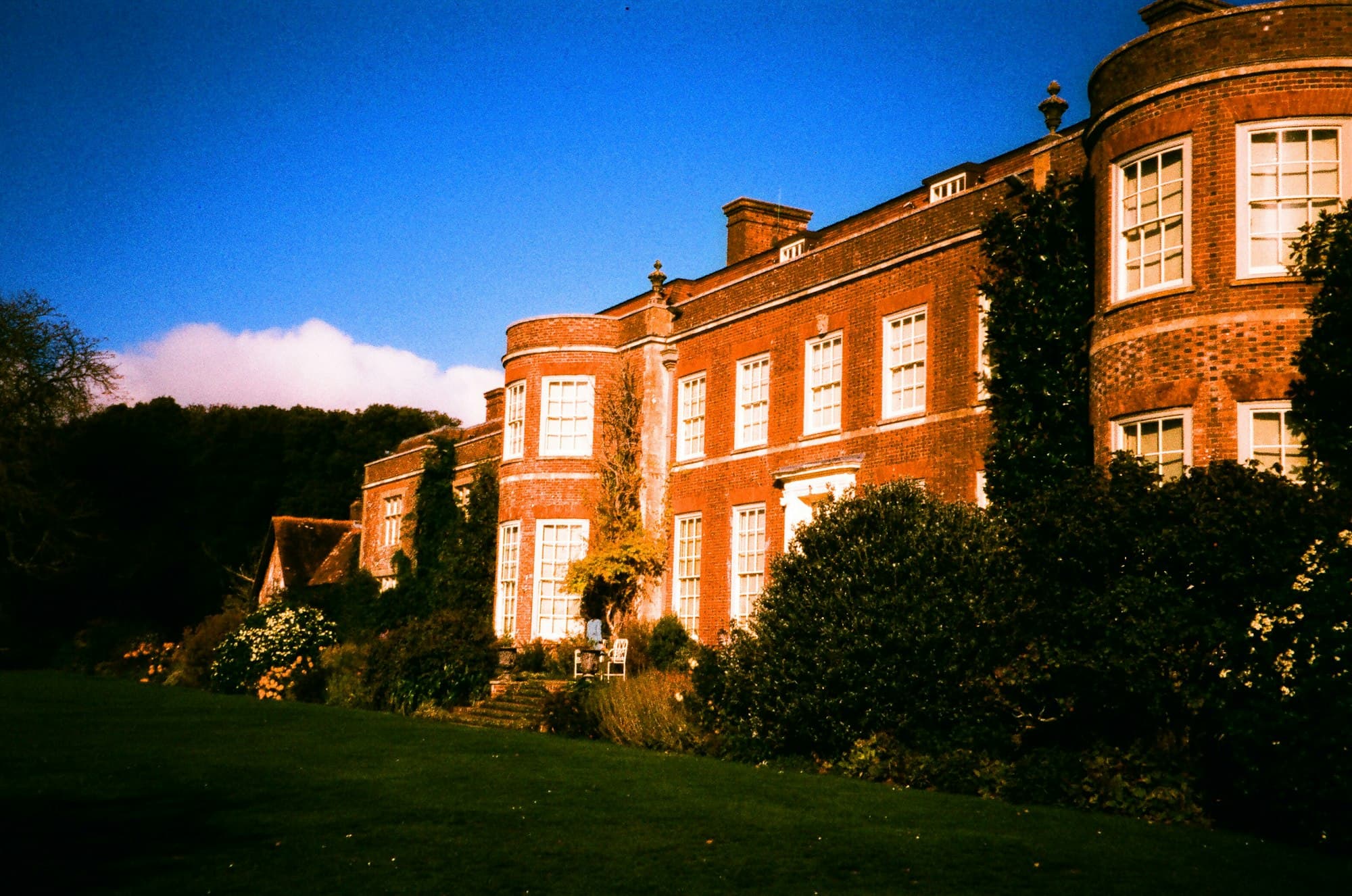 The manor and gardens at twilight