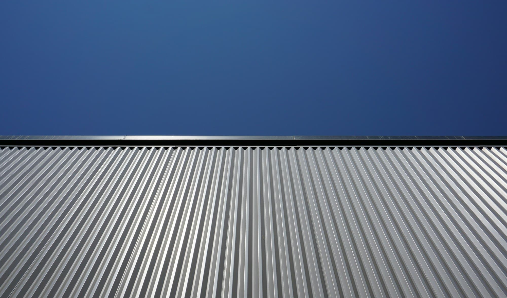 Dark standing-seam metal roof
