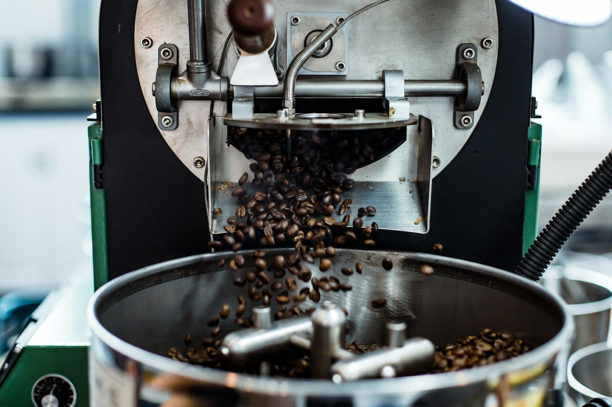 Coffee tumbling out of the roasting drum