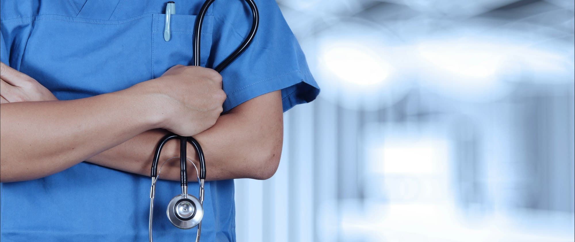 Stethoscope held in a nurse's hand